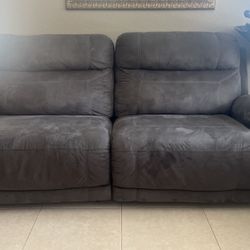 Two Sofas (reclines ) 