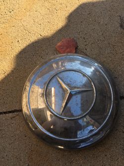 Single vintage Mercedes Hubcap