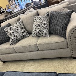 Beautiful, two-piece sofa, loveseat, and pillows