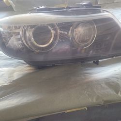 '11 BMW OEM headlights