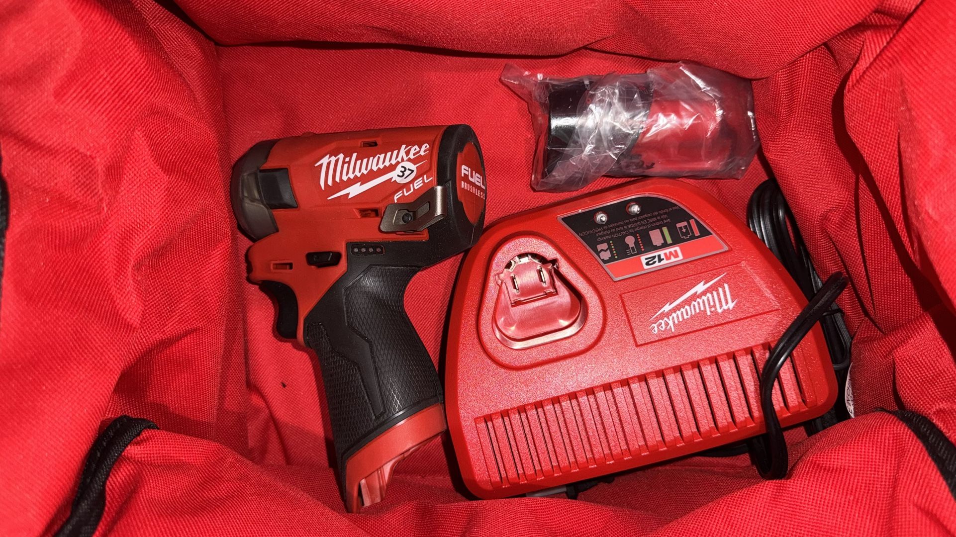 Milwaukee 2553-21 M12 FUEL 1/4 in. Hex Impact Driver Kit with One 2.0 Ah Battery, Charger and Bag
