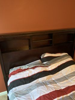Queen sized bed and mirror/dresser