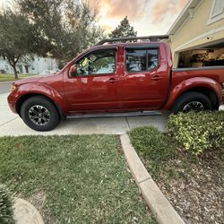 2014 Red Nissan Frontier Pro-4x 