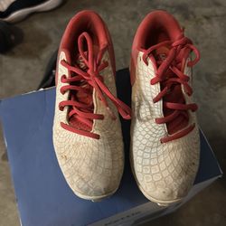 Size 1.5 softball under amor cleats