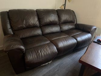 Brown leather Couch seats 3