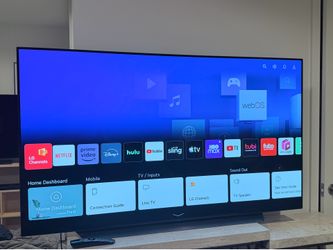 LG OLED 65” 2023 with complementary TV stand