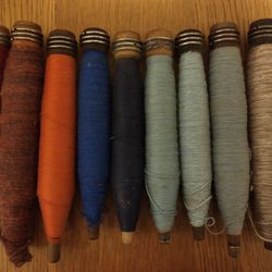Collection of 9 Wooden Textile Bobbins (With Textile)