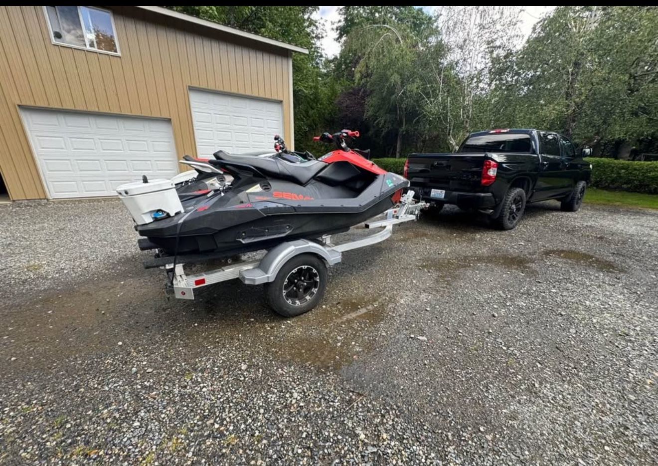 Two jet ski ‘s with trailer. Seadoo trixx