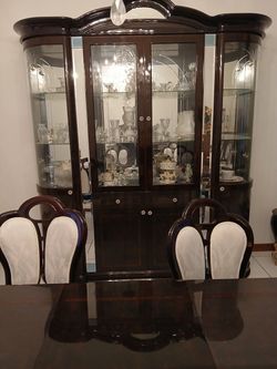 dining room table , dishes and buffet