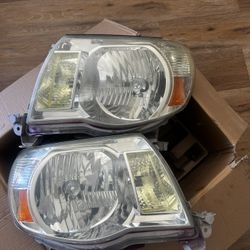 OEM 2nd Gen Tacoma headlights $75 OBO