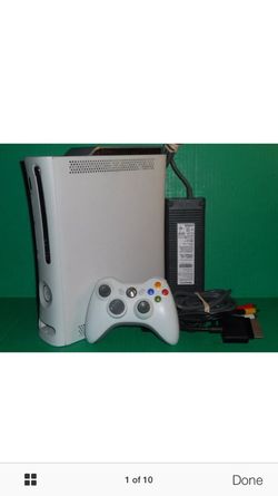 Xbox 360 console with games