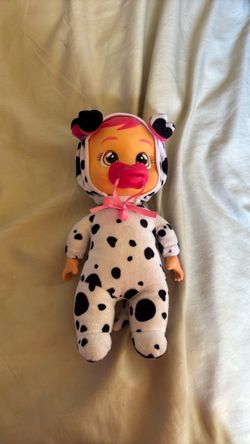 Baby doll with pacifier and cow costume