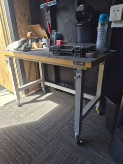 Adjustable height Rolling bench.