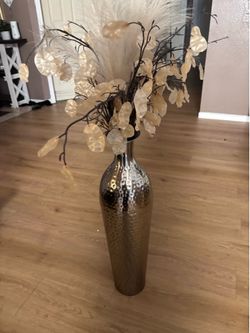 Large vase with artificial plants