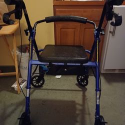 Black and Blue Rollator. Gently Used. A Steel For the Money!!! Local  pickup only 