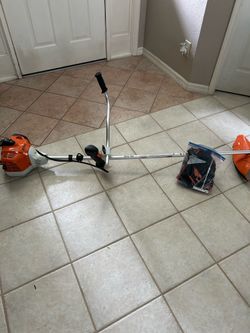 New gas Stihl FS 240 commercial string trimmer complete with accessories