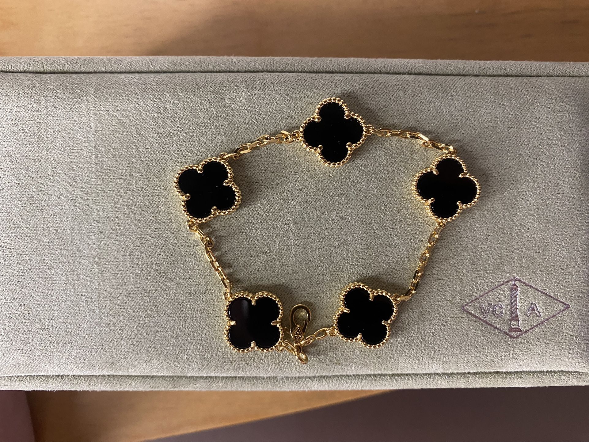 Van Cleef Black and Gold Bracelet
