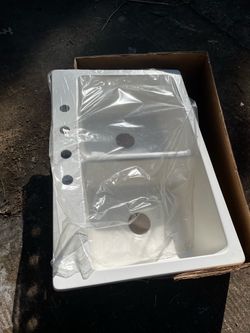 4 hole white sink.
