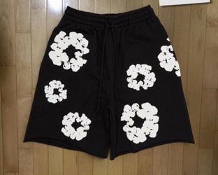 Black and white denim tears shorts