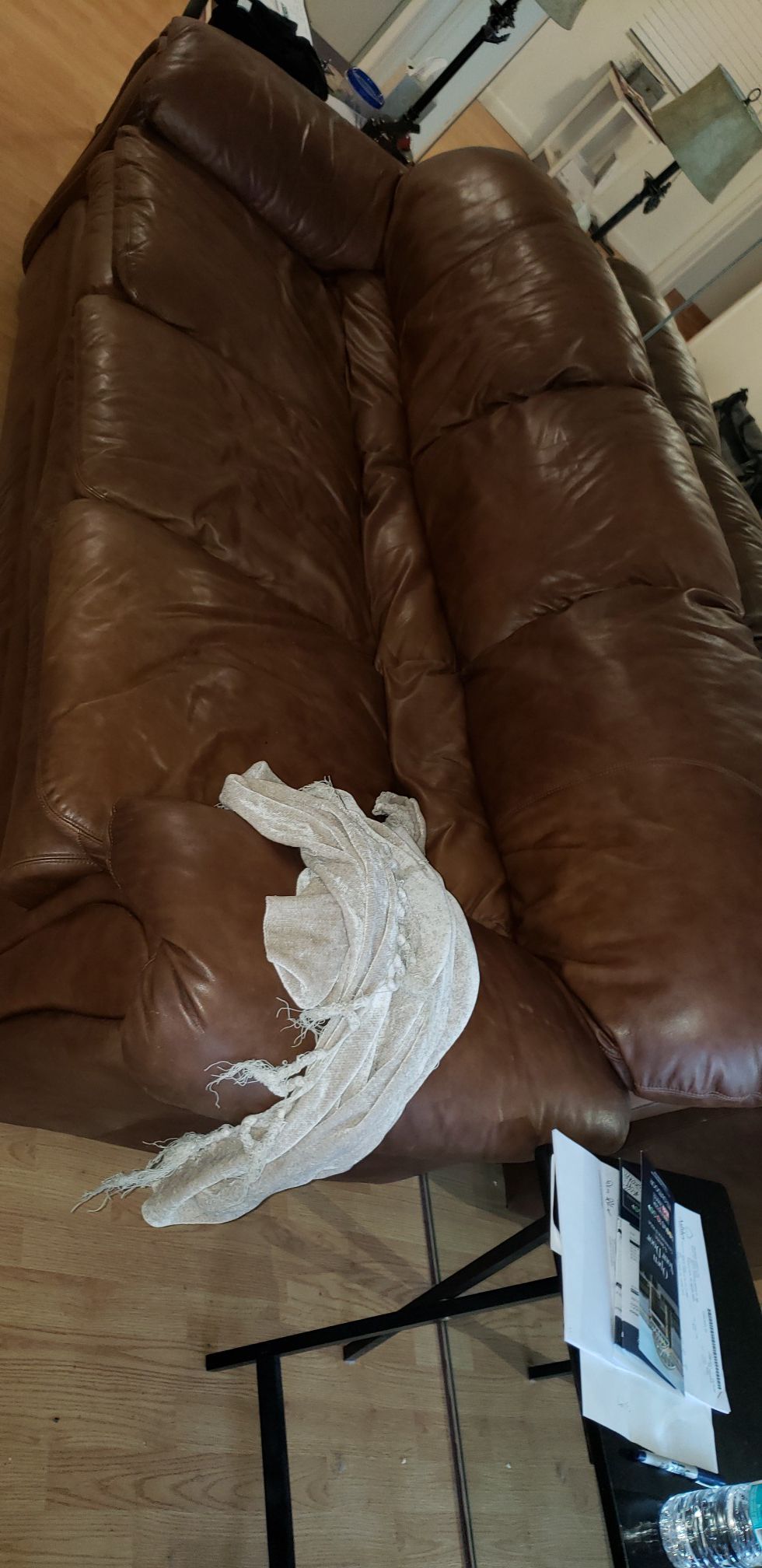 A big brown leather couch, excellent condition, super comfy and clean and leather love chair excellent condition, hardly used. 300 or best offer