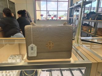 Tory Burch purse layway available 10% Dwon if you interested please make sure you ask for Maribel thank you