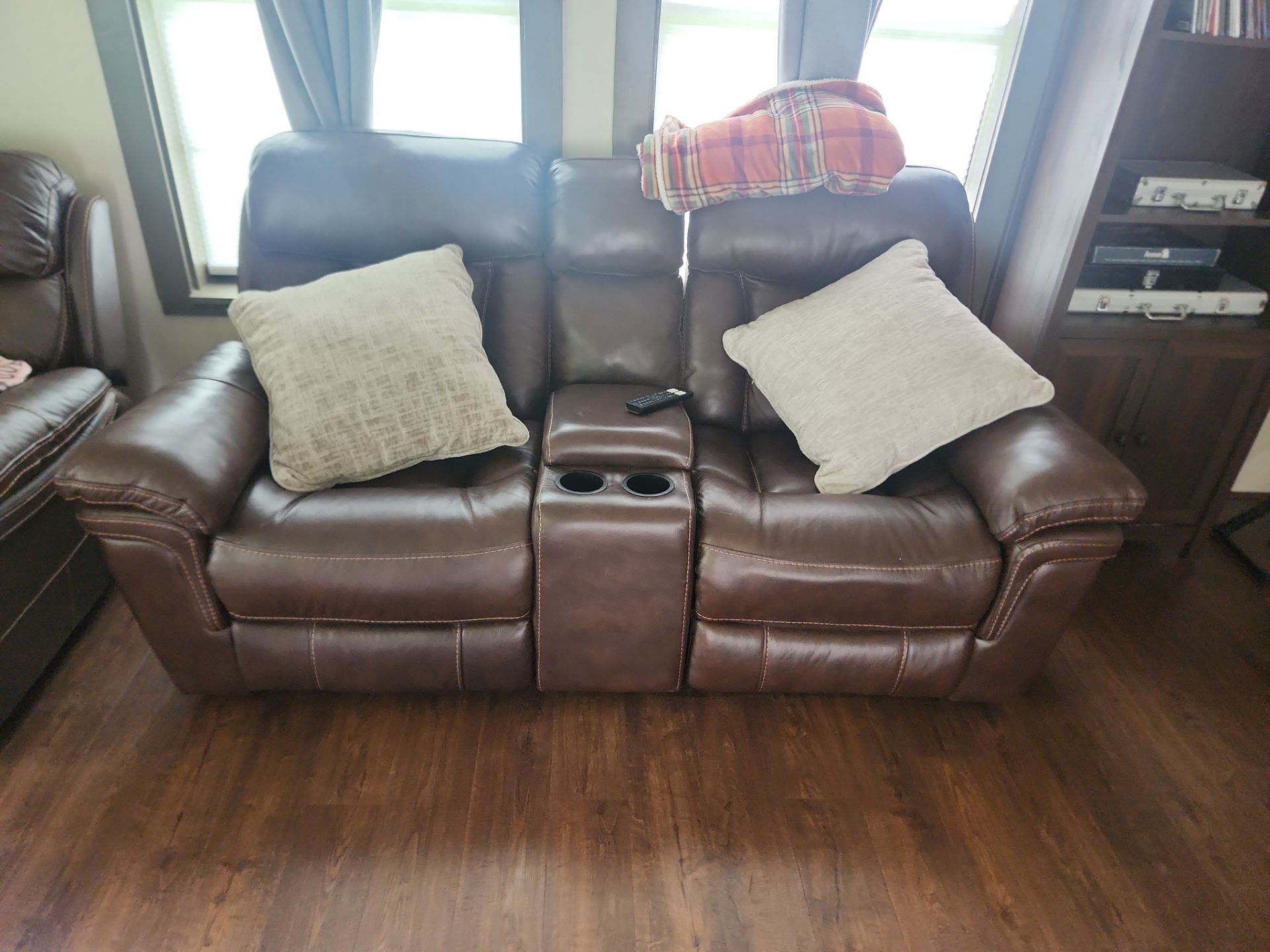 Leather couch with recliner and charger capabilities