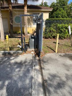 Electric gate noisy or moving uneven? Chain, motor, sensors, and full gate issues
