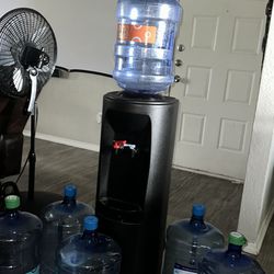 Water dispenser top hot/cold  with everything and with an extra free mini cooler