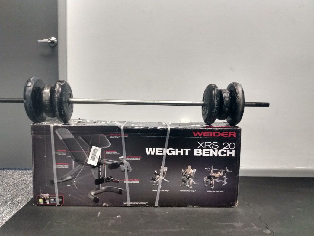 Gym bench new, with preacher arm curl & 80 lbs bar Adjustable plates!!