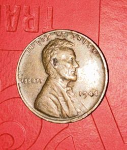 1944 Lincoln Wheat penny no mint mark. One Cent Rim Error "L" In Liberty
