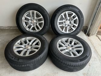 Set of 4 Brand new wheels and tires for Chevy Suburban
