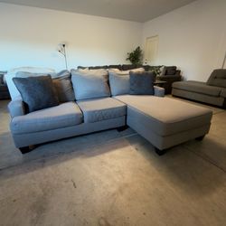 Can deliver Ashley grey sectional couch