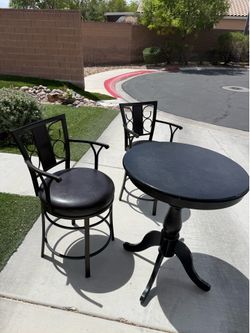 Bar stools and table