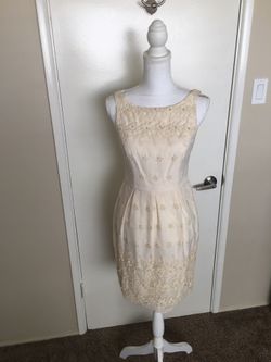 Aidan Mattox ivory color with pearls dress.