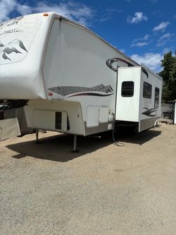 03 Keystone Raptor Toy hauler (fifth wheel )