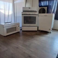 Whirlpool appliances : stove/oven, above the oven microwave hood, dishwasher and  evaporative cooler... $500  for everything 