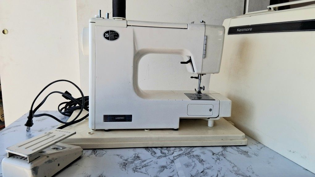 Kenmore Sewing Machine
Nice Kenmore sewing machine with metal pedal