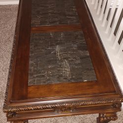 Ashley Tuscan Coffee Table With Granite Inlays.  