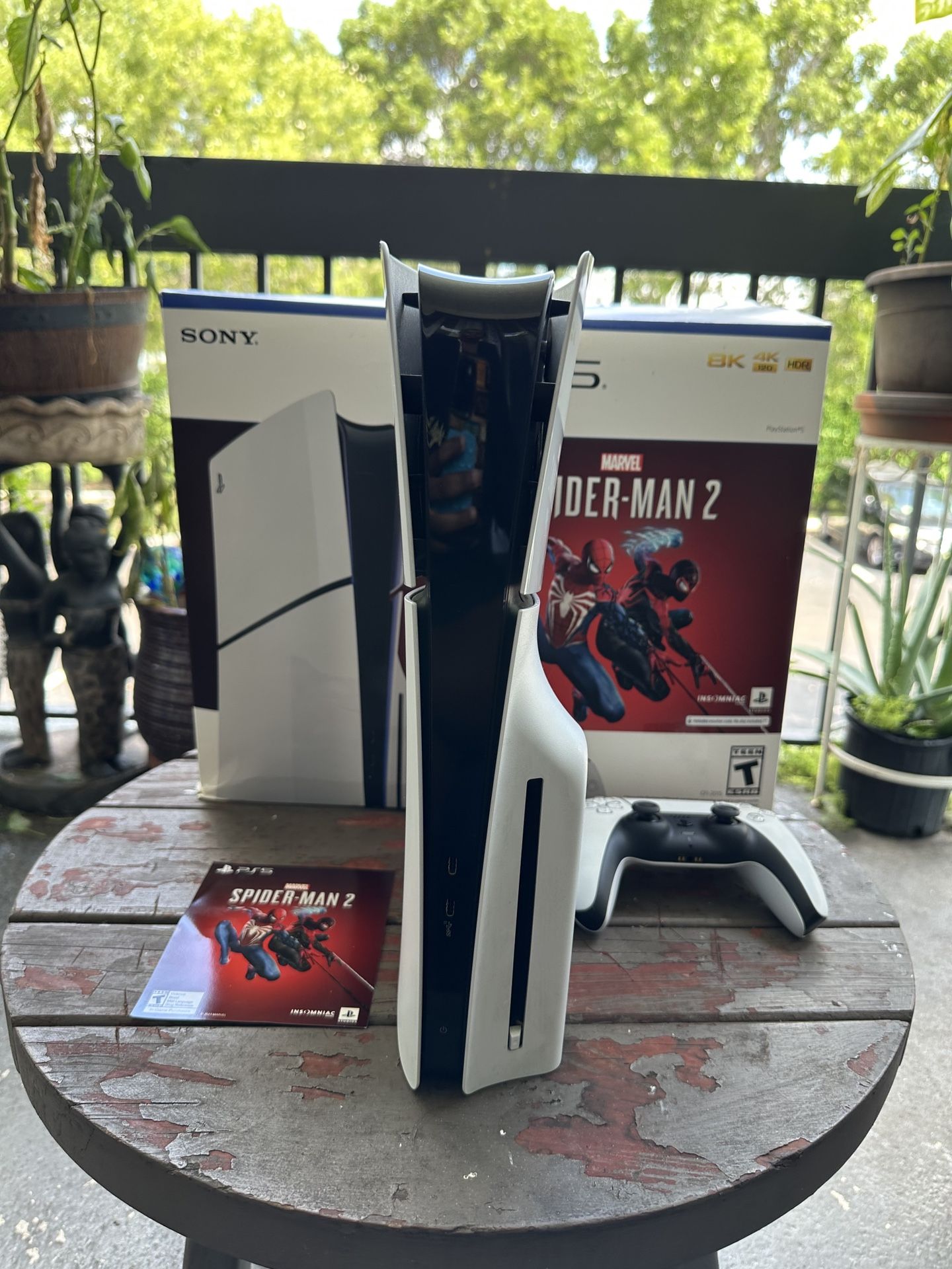 New Sony PS5 Slim Disc Version 1TB With Spider-Man 2 Voucher. Price is firm/ Read description
