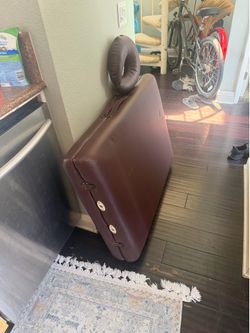 Massage table