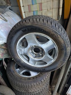 4 chevy Malibu Rims with decent tires