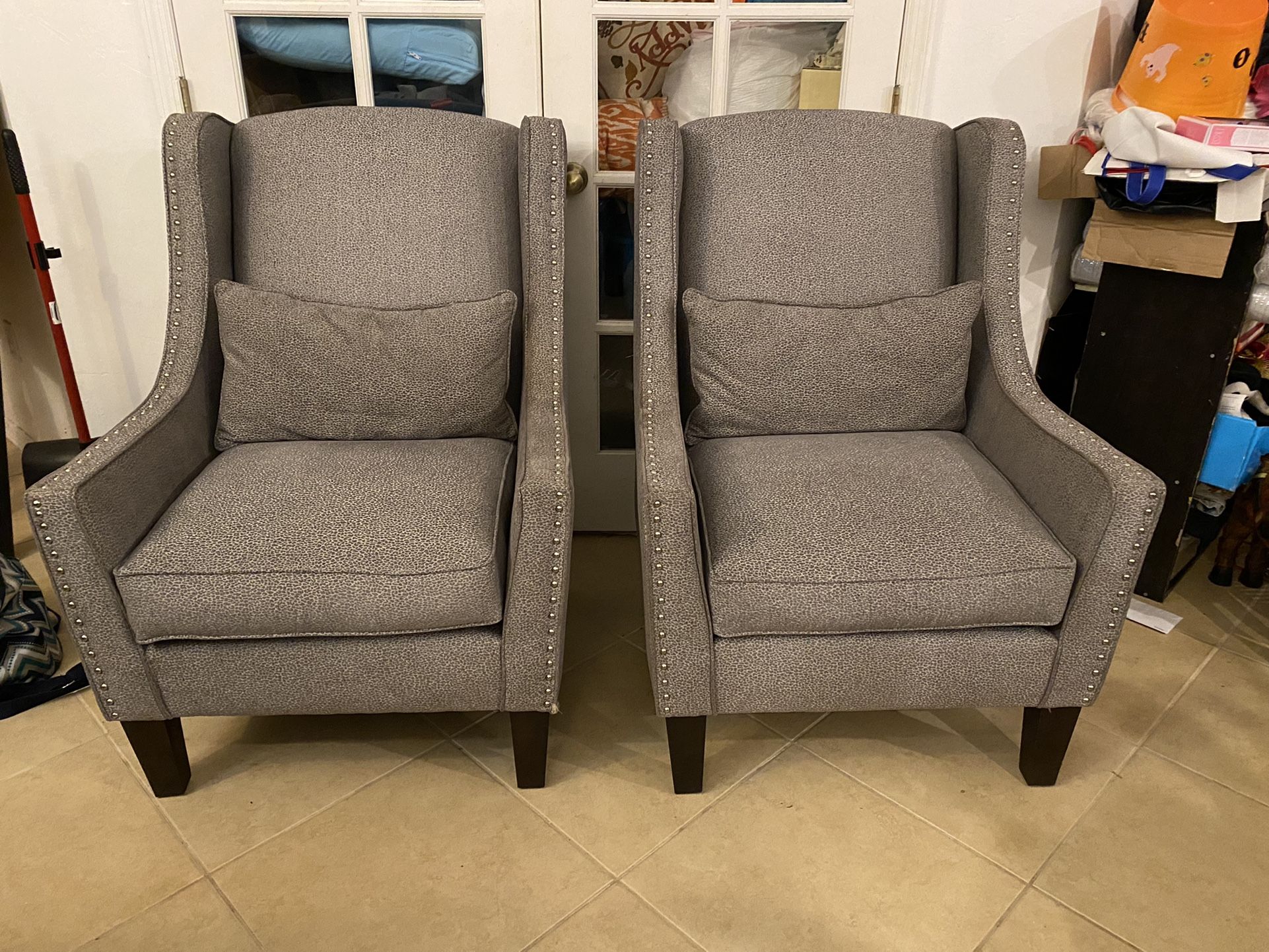 Pair Of Grey Studded Arm Chairs