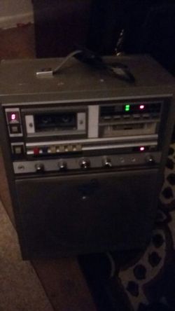 Vintage portable 8track and cassete player karaoke