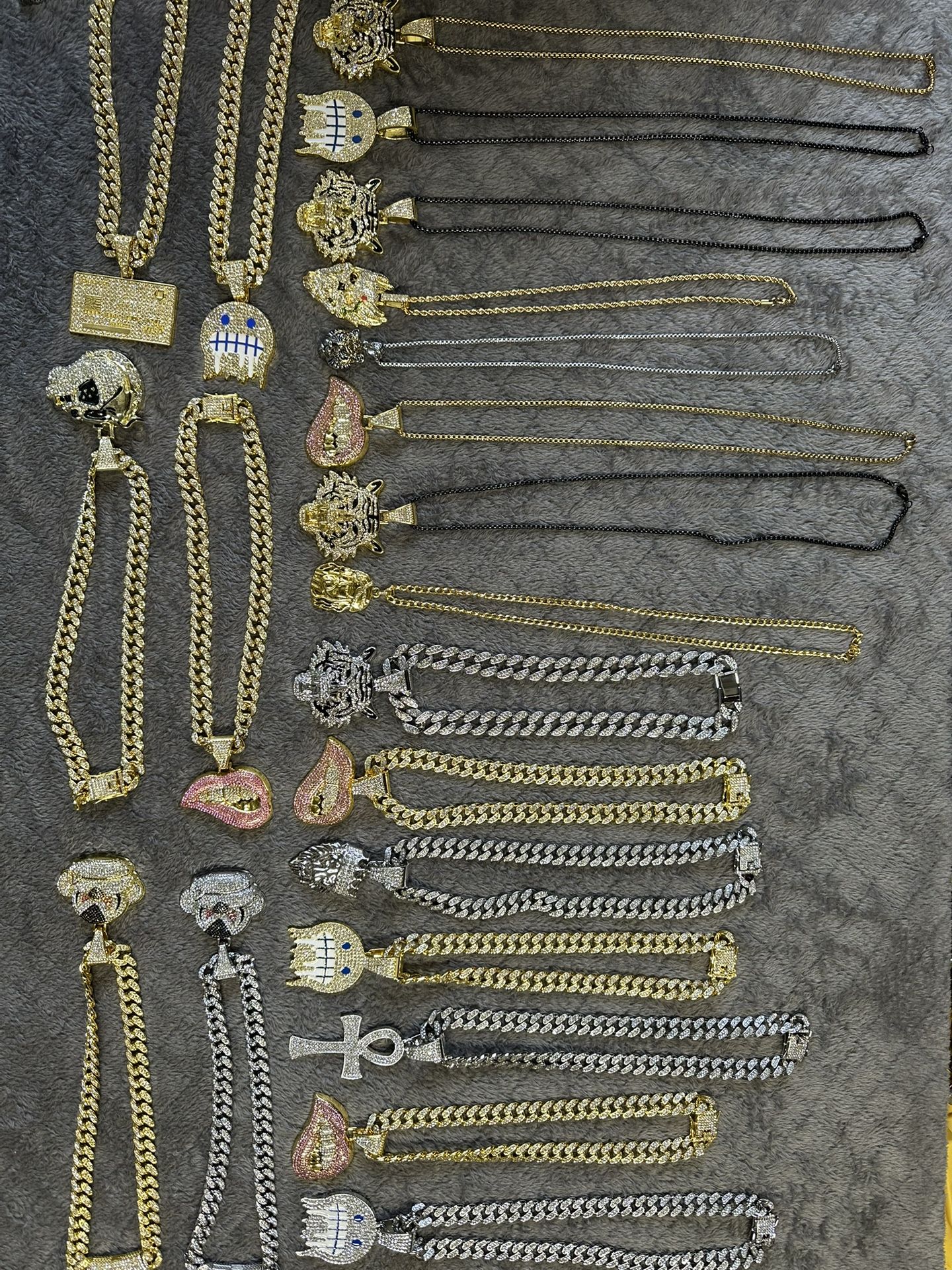 Mens new without tags blinged out demon with 24 inch gold chain.