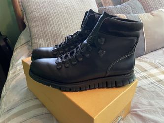 Coleman Boots 8.5.         New  