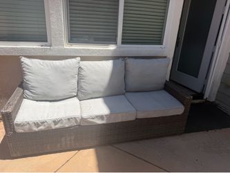 Outdoor wicker lounge chair and couch