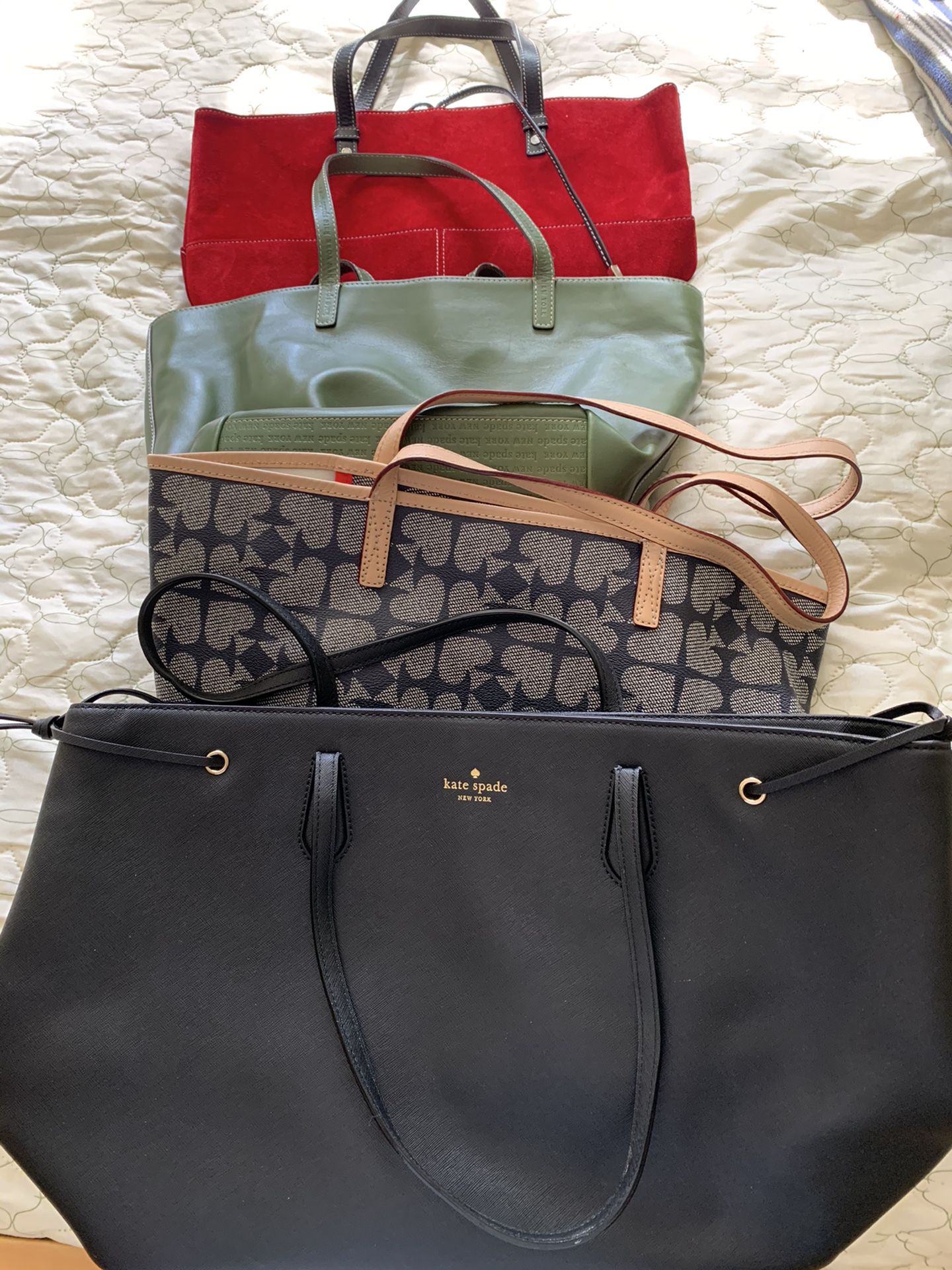 4 Kate spade bags. One w dust bag included .