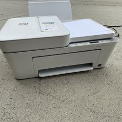Printer And Stack Of Paper 