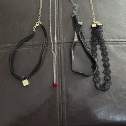 A Necklace And 3 Chokers