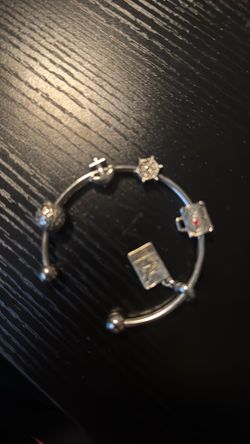 Silver Bracelet with Charms.